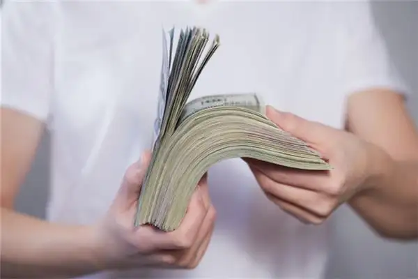 Dream Interpretation of Holding Spirit Money in Your Hand - NuvoraDream-DreamDecode